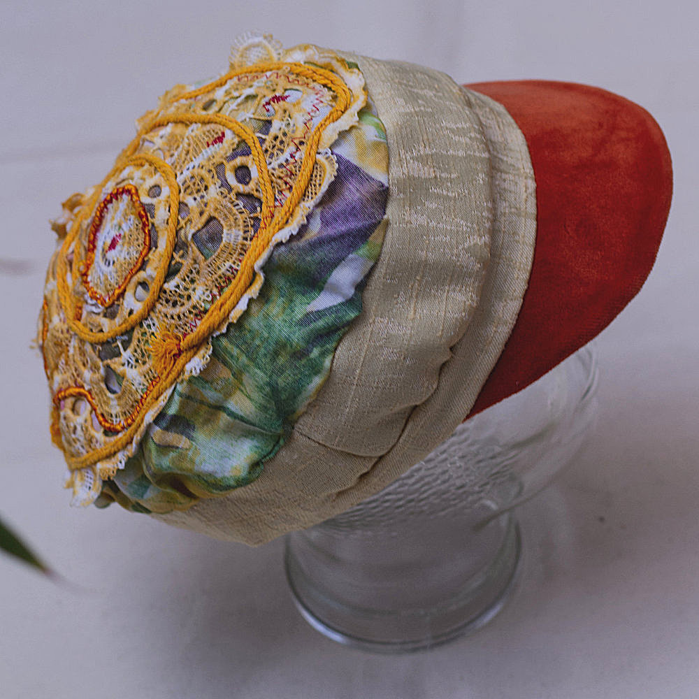 Upcycled reversible cap embroidery